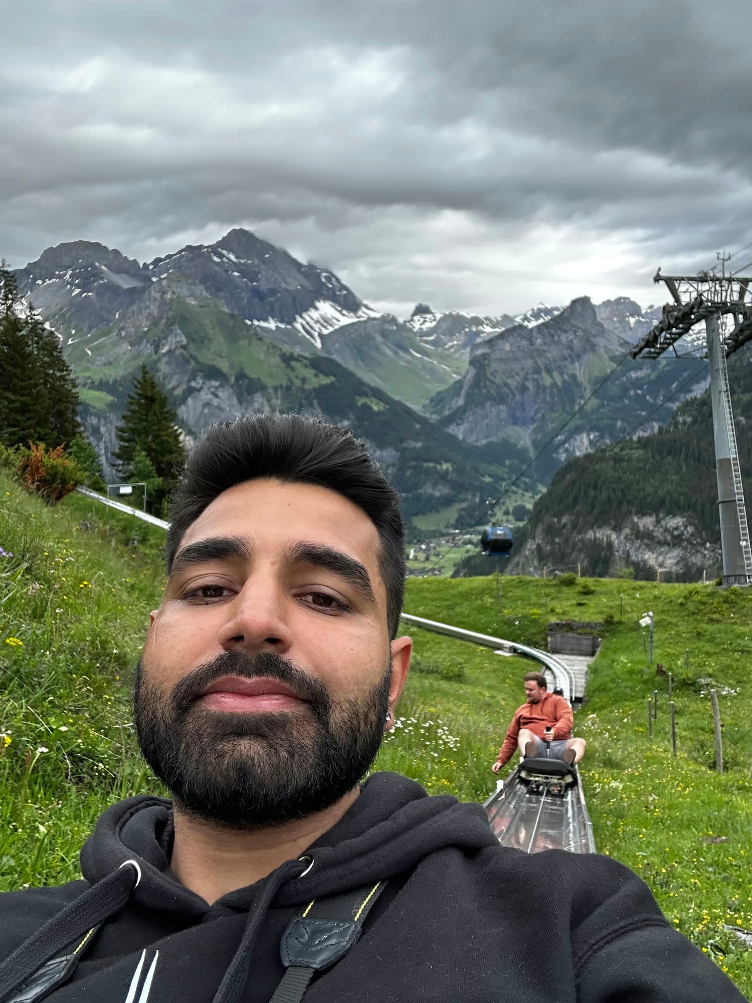 Selfie of me with the Kandersteg valley and the gondola pylons behind