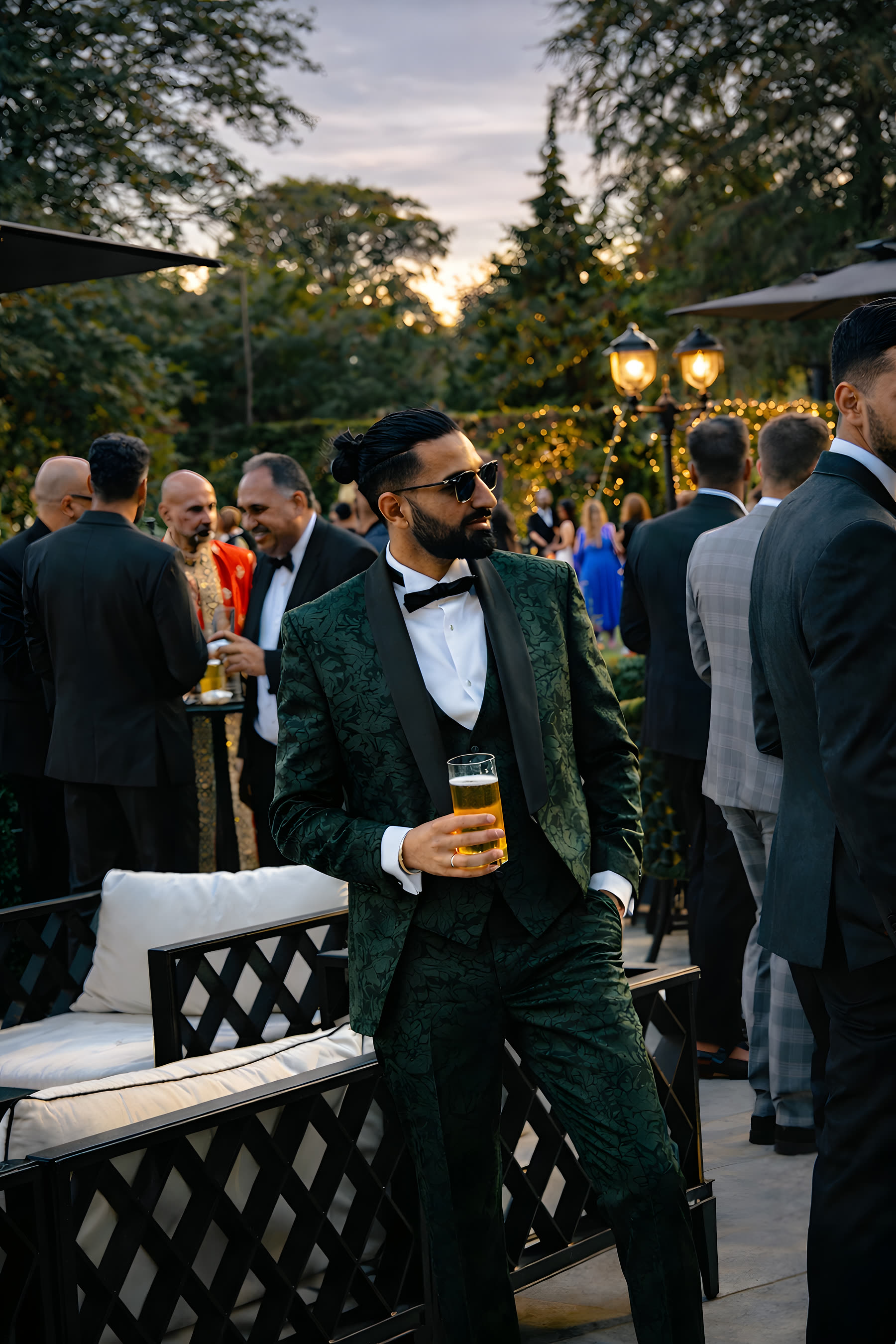 Black tie, three-piece suit, golden hour.